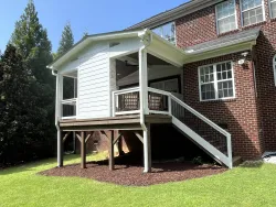 Elegant Covered Porch with Dining Area in Charlotte, NC