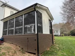 Elegant Screen Porch with View of Garden