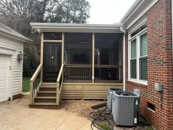 Classic Screened Porch with Wooden Details