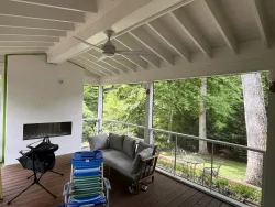 Stylish Screened Porch with Sectional Seating