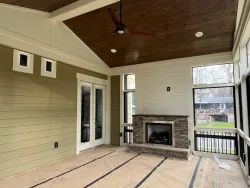 Charming Screened Porch with Fireplace