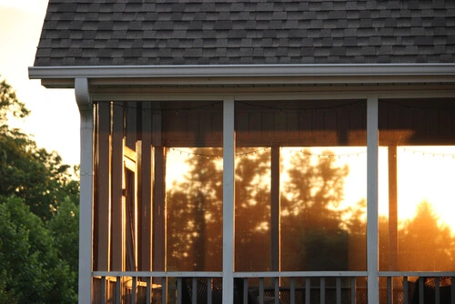 Sunset through the screened in porch
